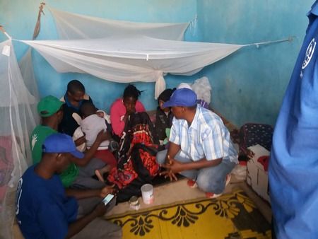 Persons who were deported at Assamaka with IOM staff